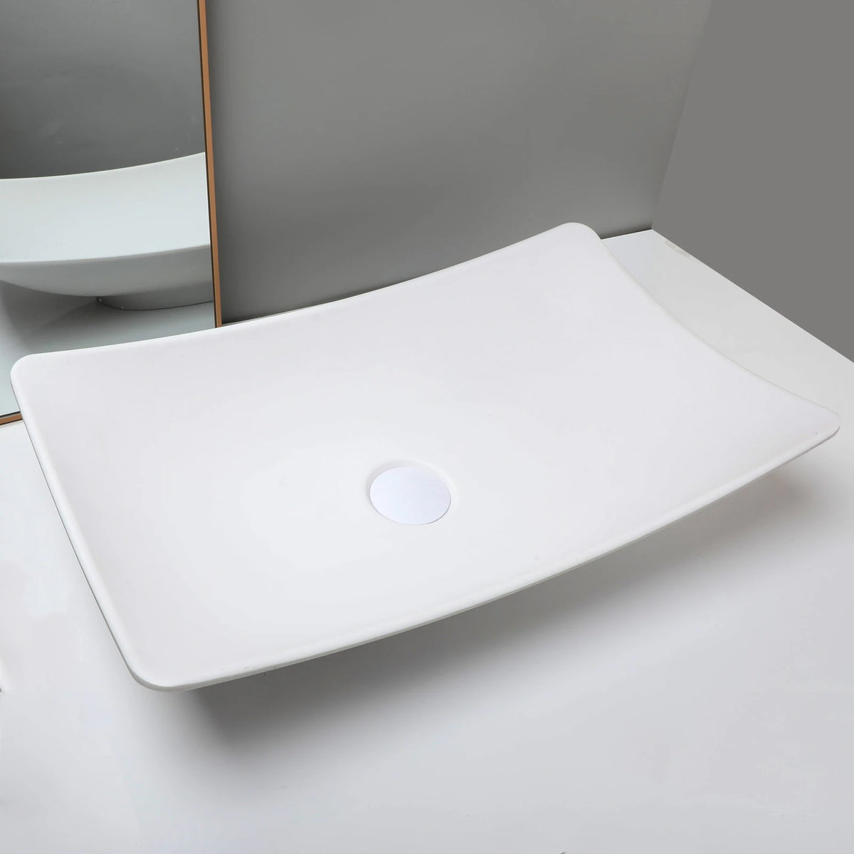 ZAPPO white bathroom vessel sink with round drain cover, above-counter ceramic washbasin.