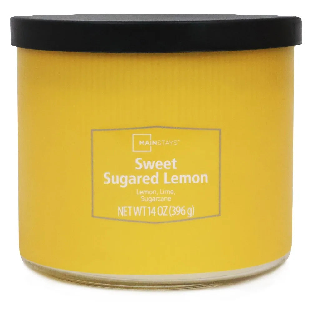 Sweet Sugared Lemon scented candle in a yellow jar with a black lid, Mainstays 14 oz
