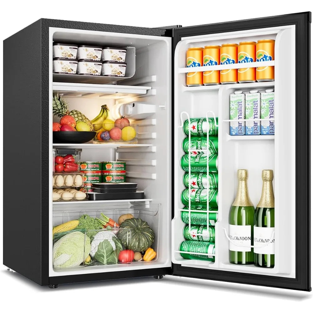 Black 3.2 cu ft single-door mini fridge with adjustable thermostat, stocked with produce and Chandon/Heineken beverages.