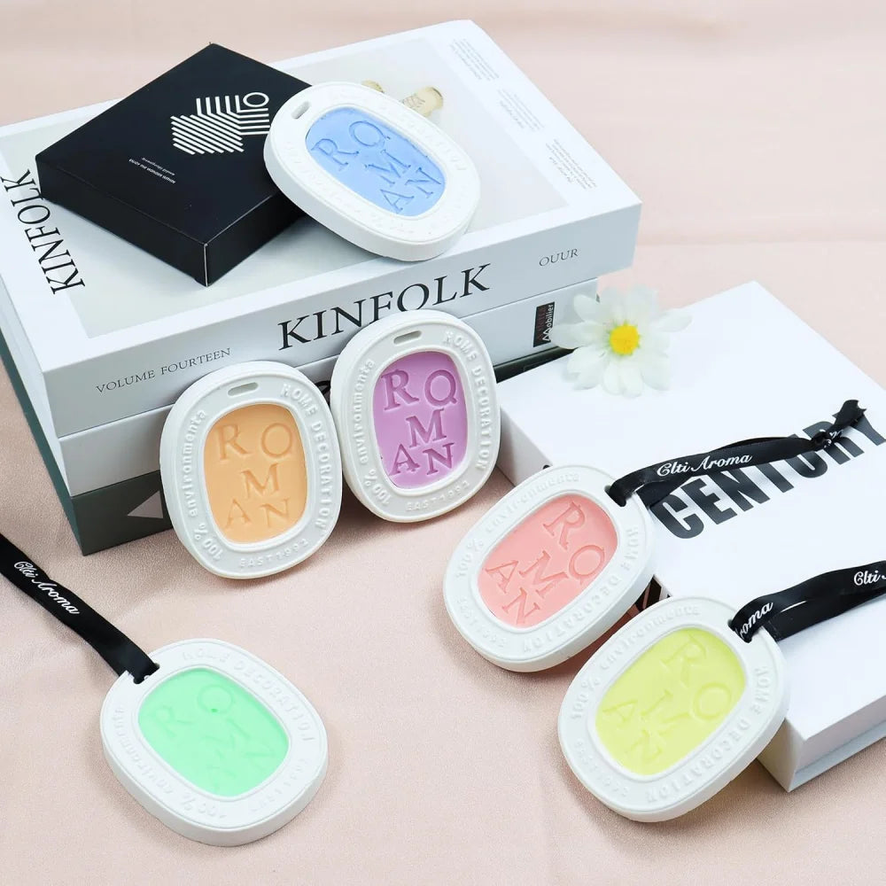 Hanging aromatherapy tablets, six pastel-colored discs in white oval cases for wardrobes and drawers