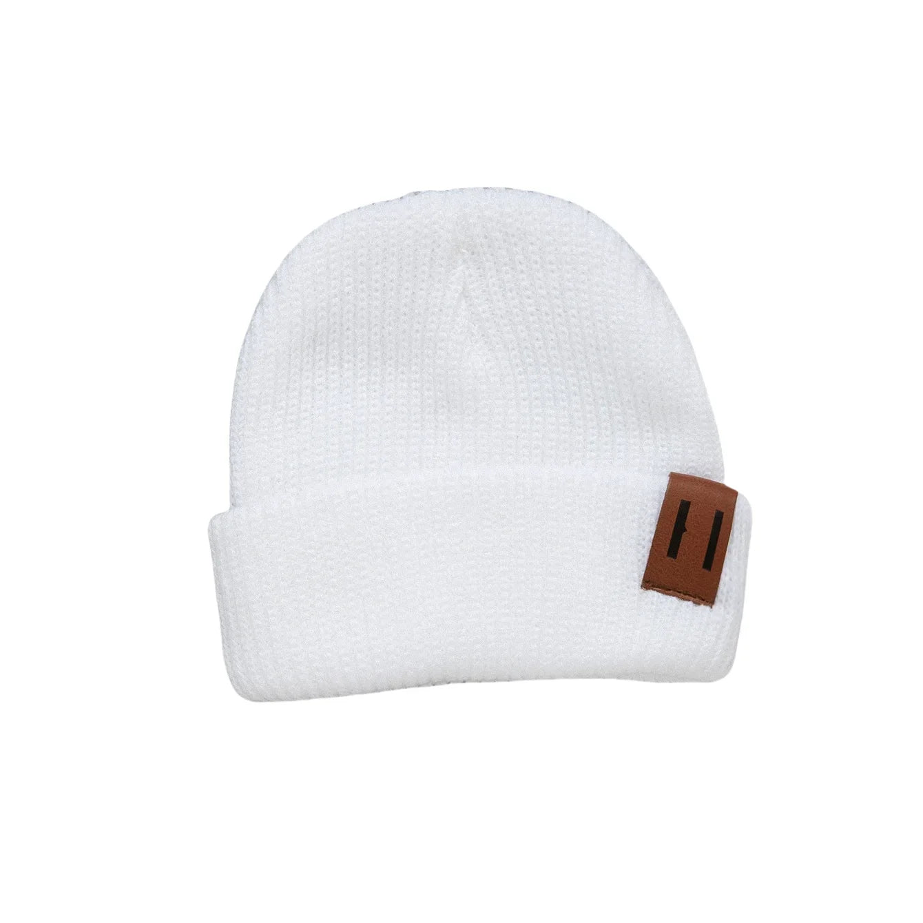 White baby knit beanie with folded cuff and brown leather patch