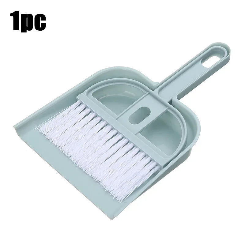 Mini desk broom and dustpan set in pastel blue with white bristles for cozy home desktop cleaning