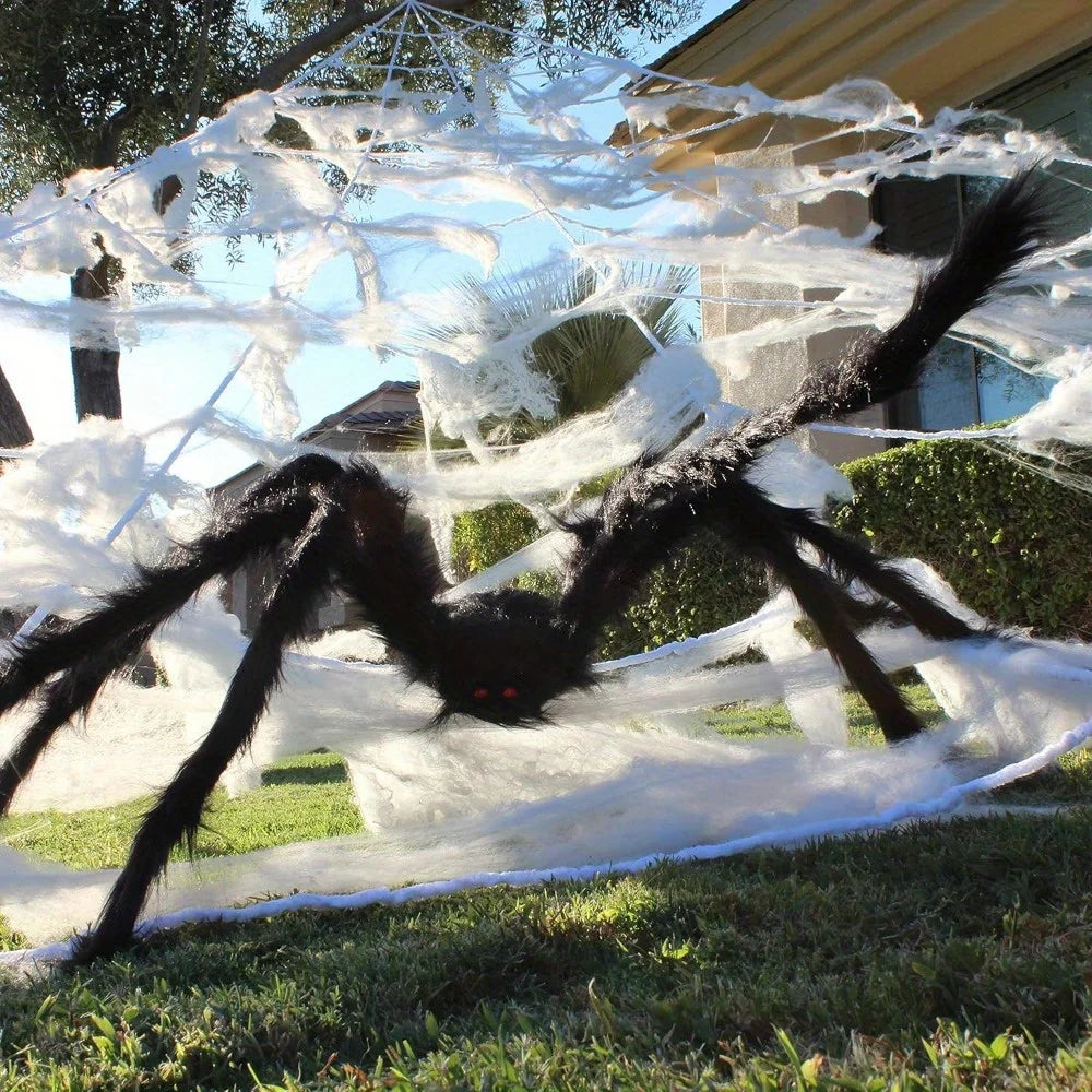 Giant black spider with white cobwebs for outdoor Halloween decor, 59in tall.
