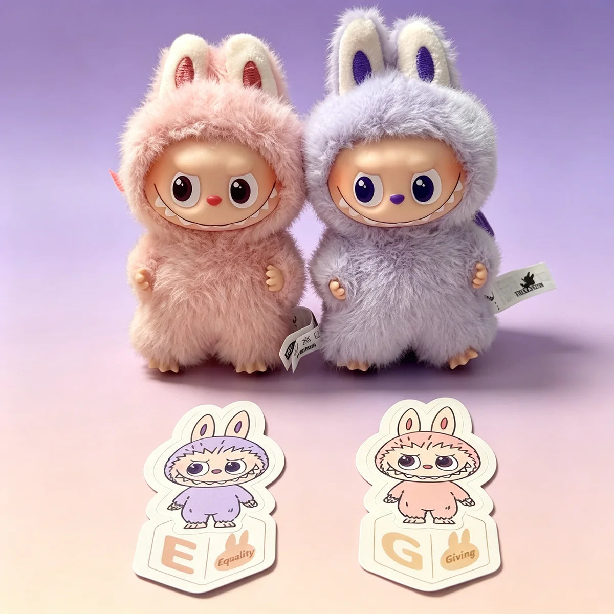 Labubu plush bunny dolls, pink and lavender fur, soft plush fabric, two-piece set by S And B Enterprise