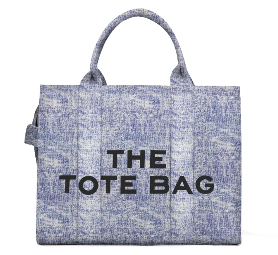 Denim canvas tote bag for women, large-capacity, blue-gray textured finish.