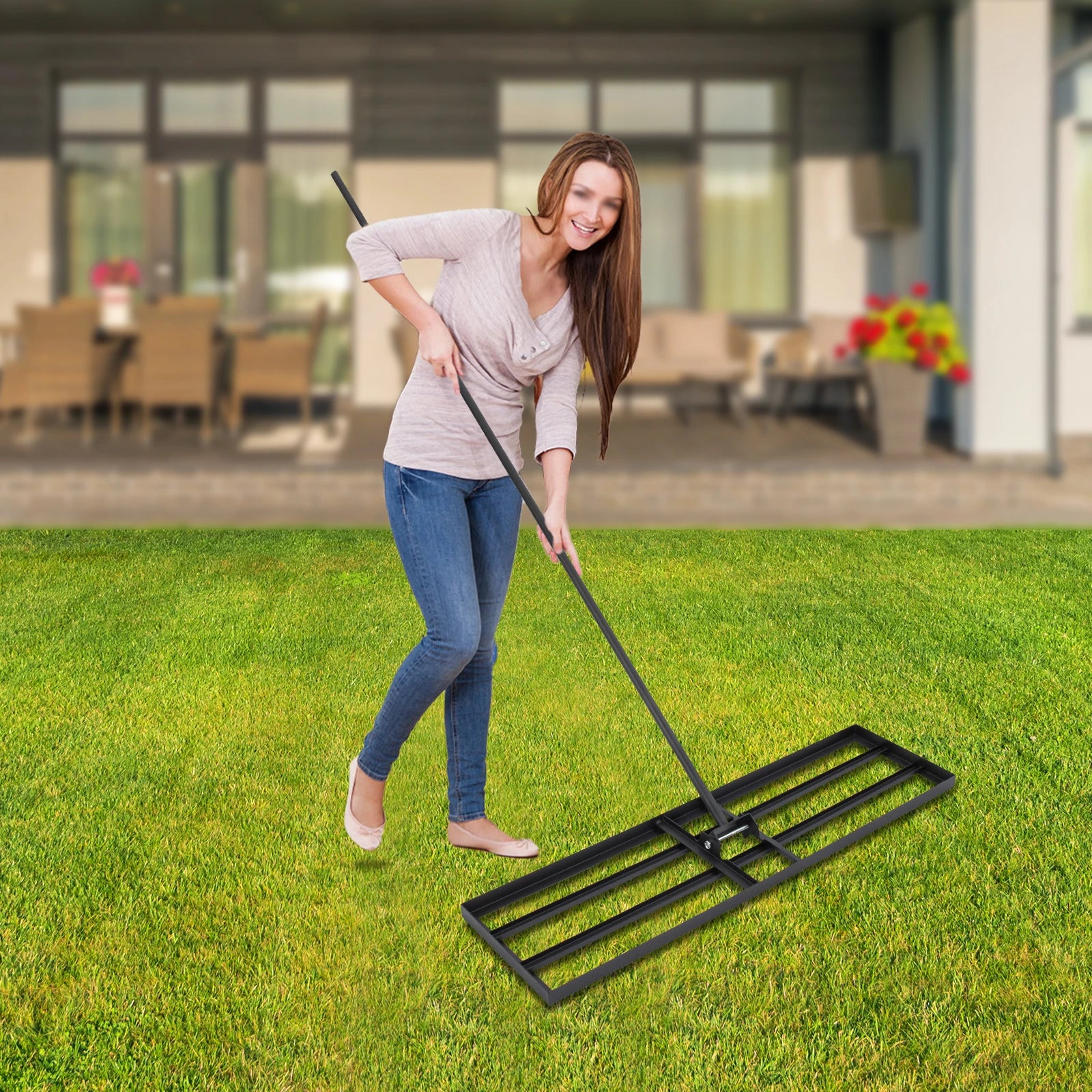 Black steel lawn leveler rake with 5.7 ft adjustable handle; heavy-duty ground rake for yard and garden.